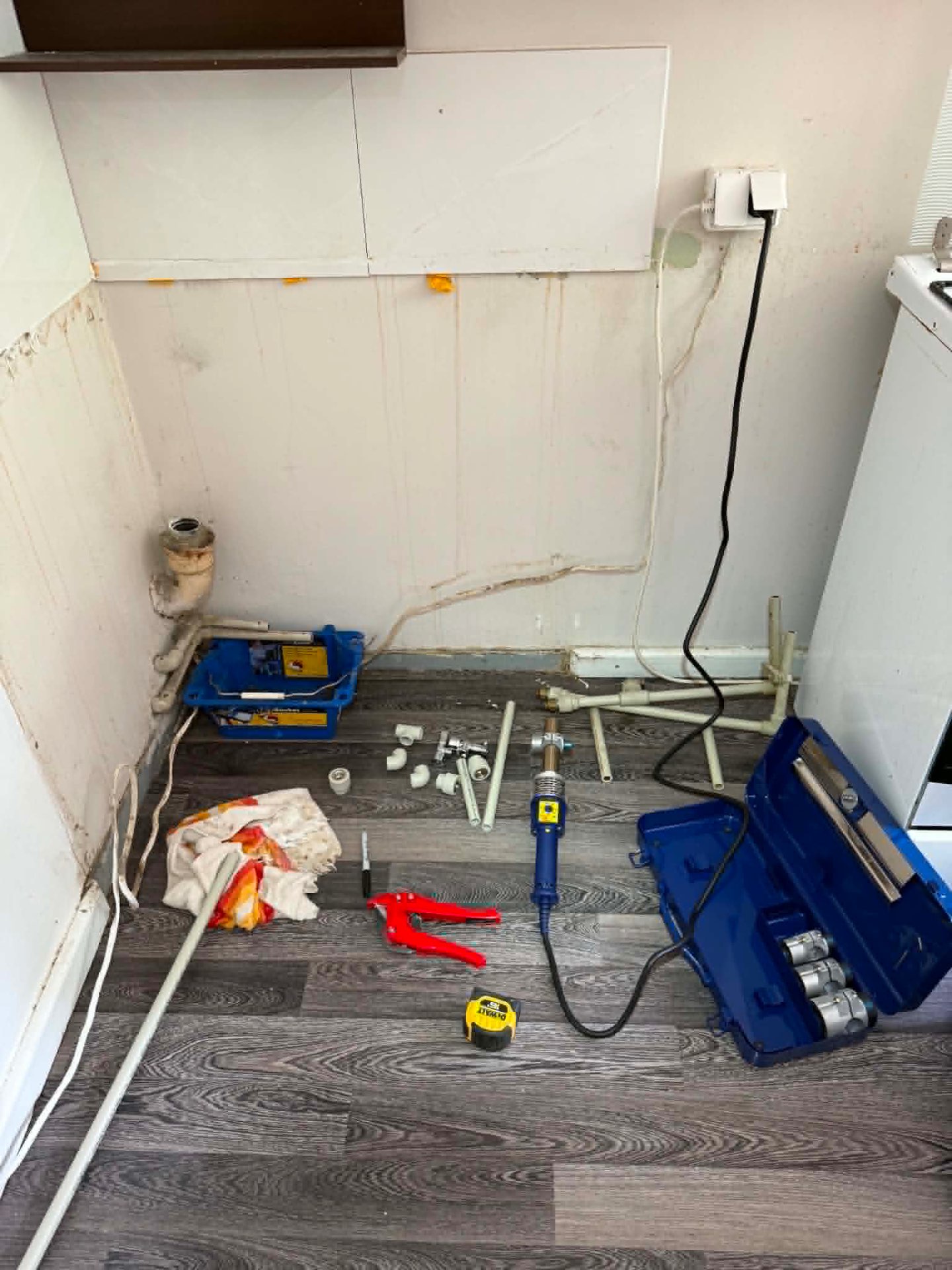 Old kitchen dismantled, preparing pipework