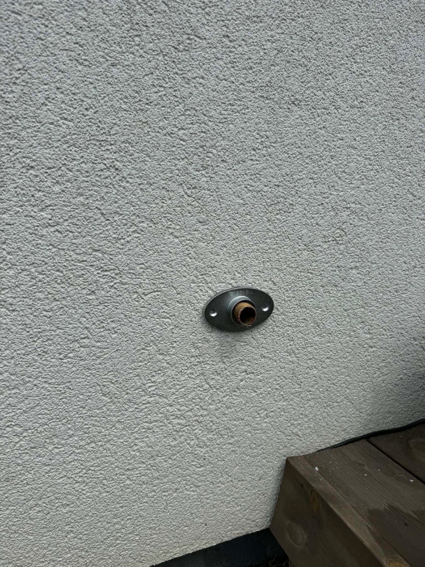 Pipe shortened, flush to wall